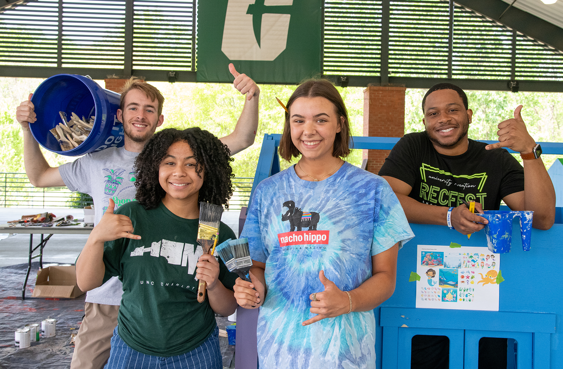 A group of scholars during the Habitat for Humanity playhouse build project.