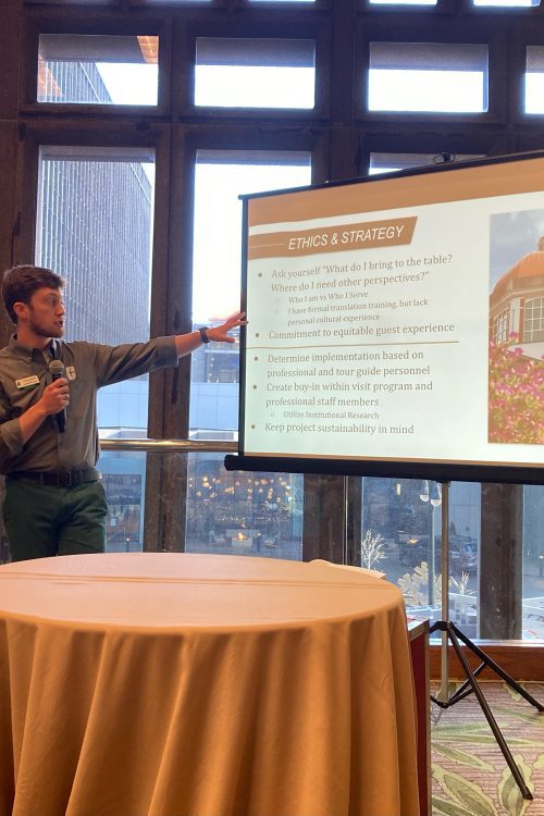 A scholar giving a presentation.